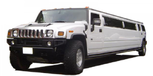 A white hummer limo is parked in the sun.